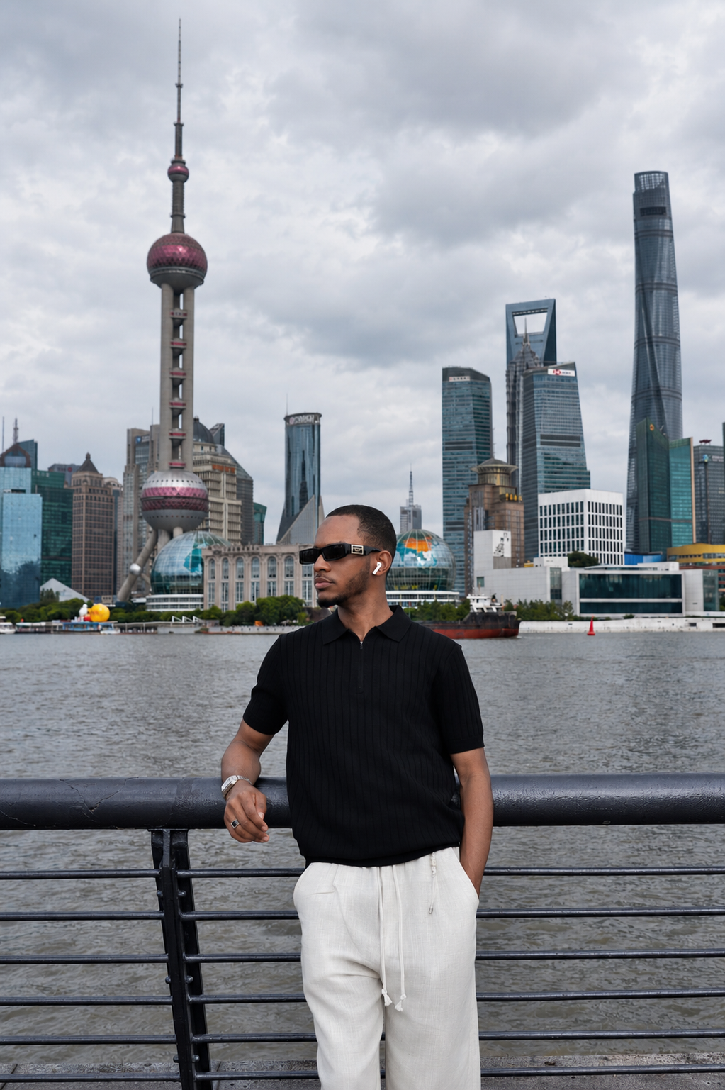 Ahmad Auwal beside the Shanghai waterfront